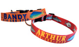 Red dog collar with bonefish, tarpon permit that is personalized with a dog's name and phone number next to an orange dog collar with offshore fishing grandslam design of a mahi, marlin and sailfish personalized with a dog's name and phone number