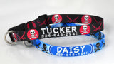 Two dog collars with artwork of skulls and crossbones that have been personalized with the dogs name and phone number